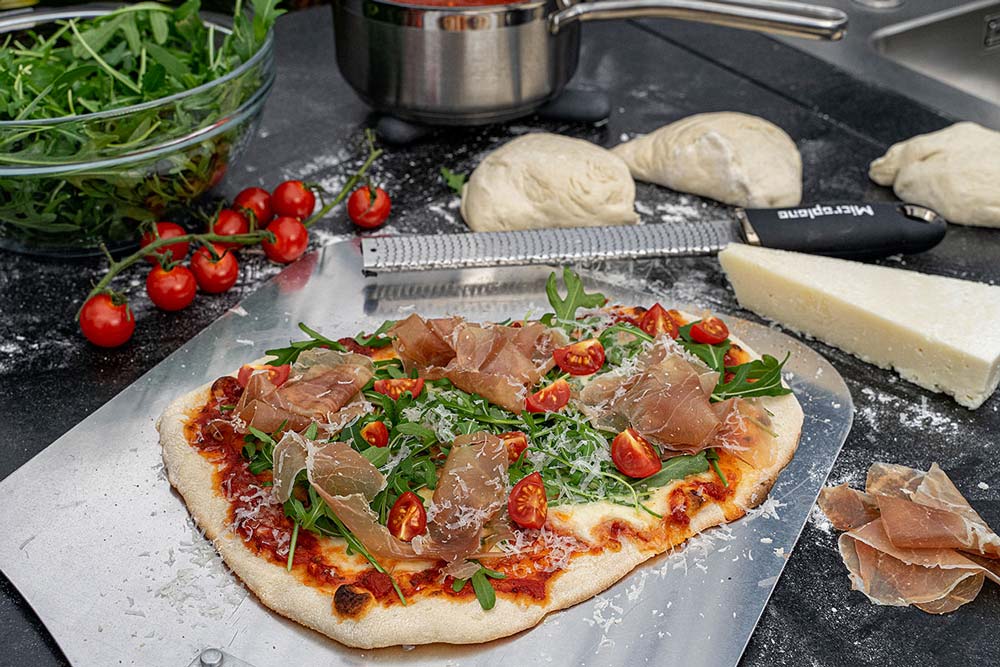 Pizza fertigstellen