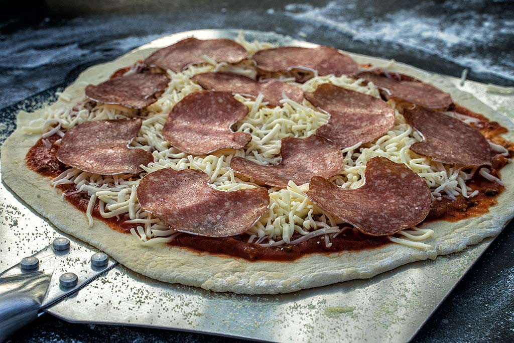 Pizza belegen