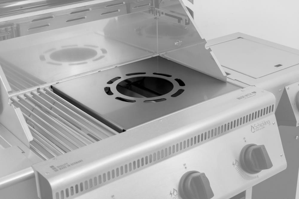 Die Wokauflage L kann ganz einfach in den modularen Rost eingesetzt werden Die Wokauflage L kann ganz einfach in den modularen Rost eingesetzt werden