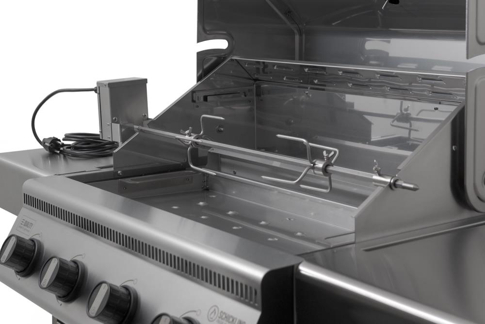 Seitlicher Blick in den Garraum des Hermann XL mit Drehspieß und Heckling Seitlicher Blick in den Garraum des Hermann XL mit Drehspieß und Heckling