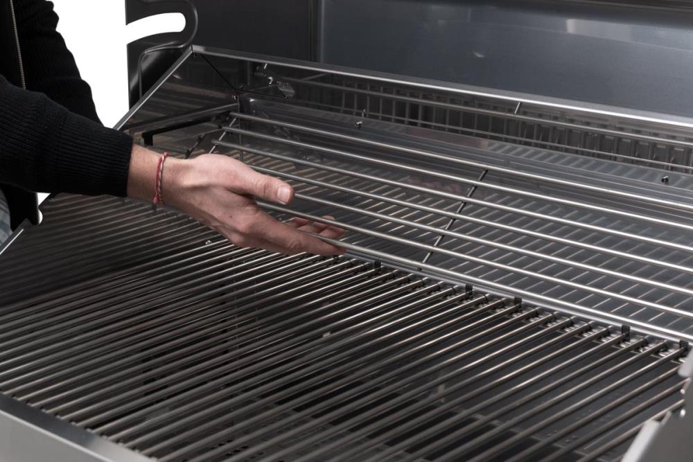 Das Warmhalterost kannruntergeklappt werden Das Warmhalterost kannruntergeklappt werden