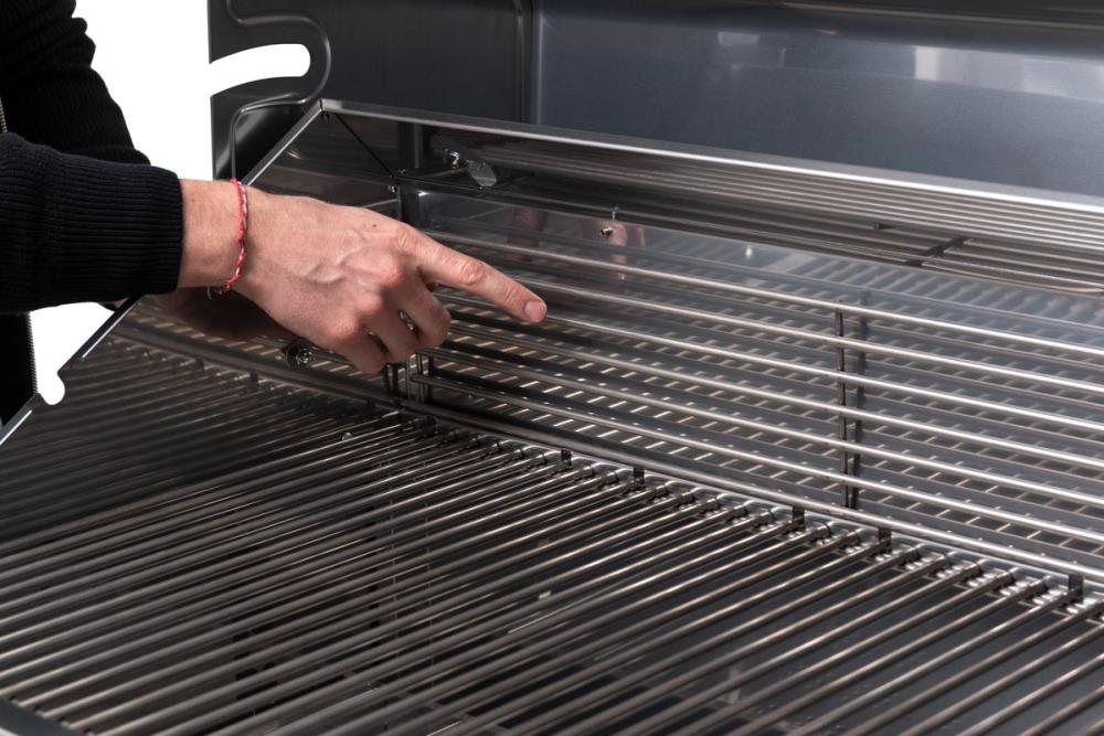 Das zur Seite geklappte Warmhalterost Das zur Seite geklappte Warmhalterost